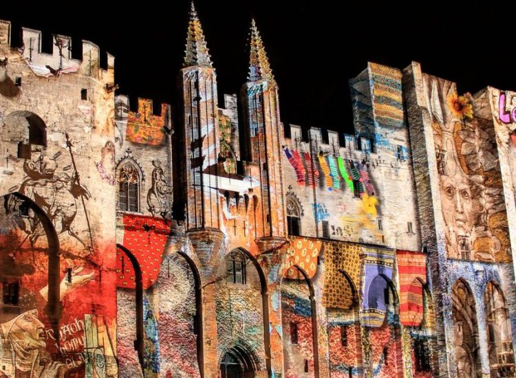 Avignon, France - November 29, 2013: Representation of the carpets of the Papal Palace during Video-mapping show onto the facade of the Pope's Palace in Avignon, France.